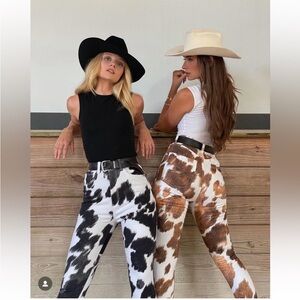 WeWoreWhat Brown and White Cowhide Jeans with inside short slit. So versatile.